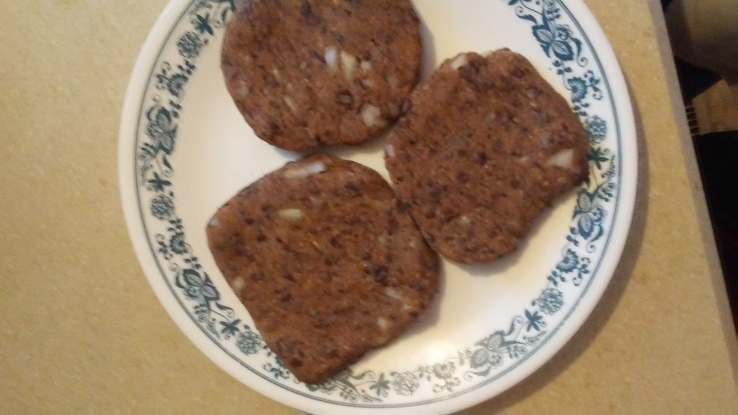 Raw Veggie Burgers On Plate