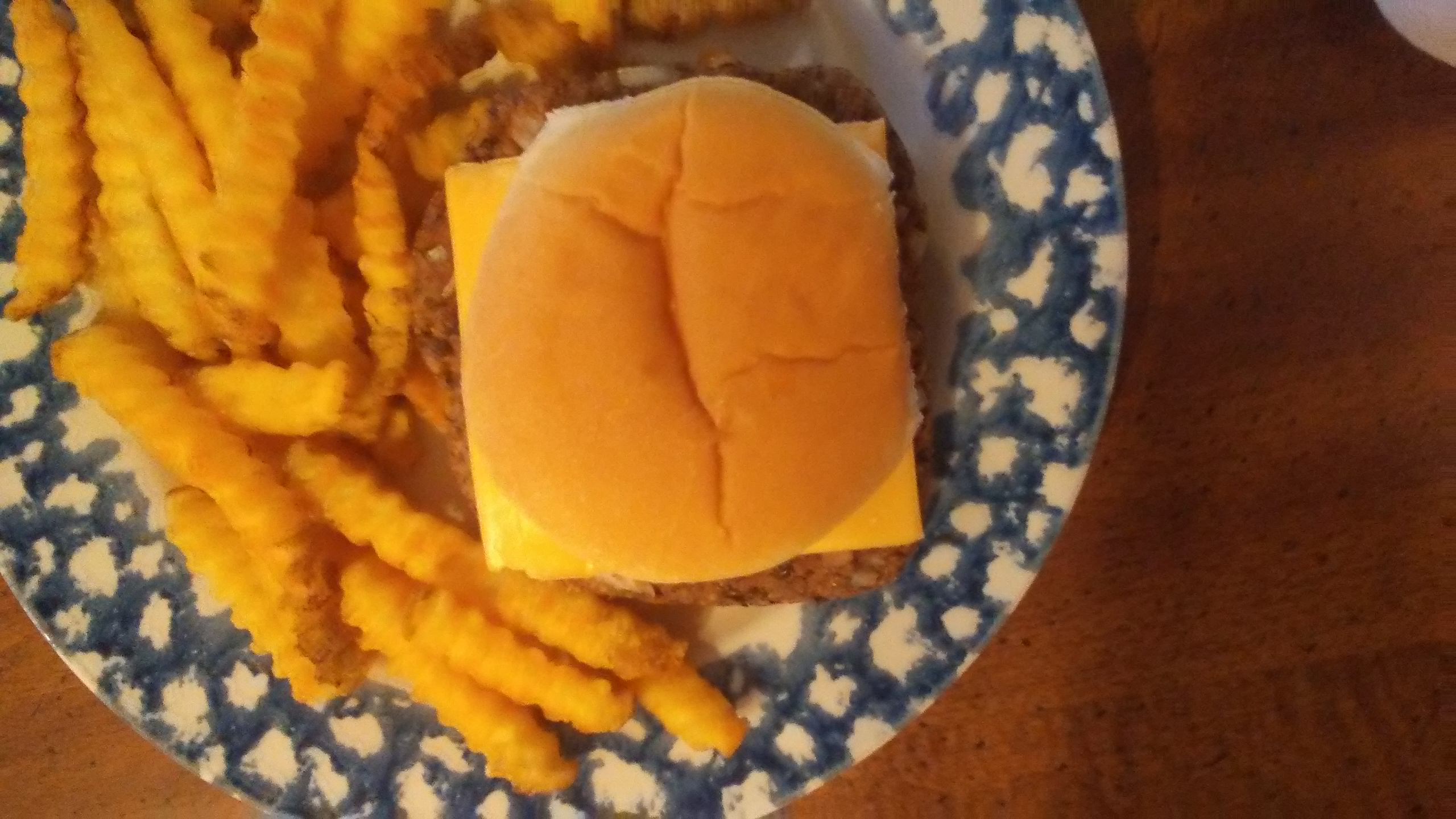 Vegetarian burgers with fries on a plate